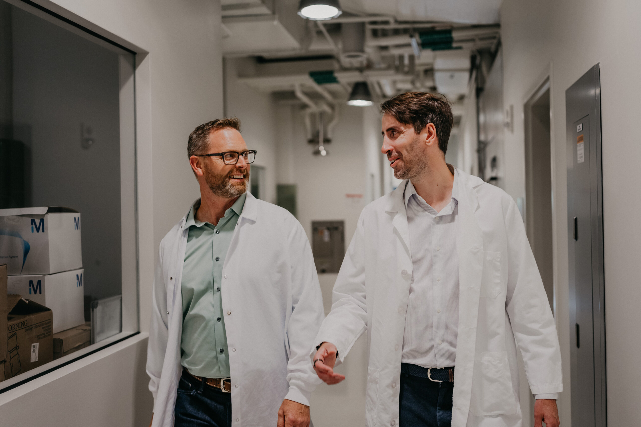 The Verb Biotics team smiles while meeting to discuss